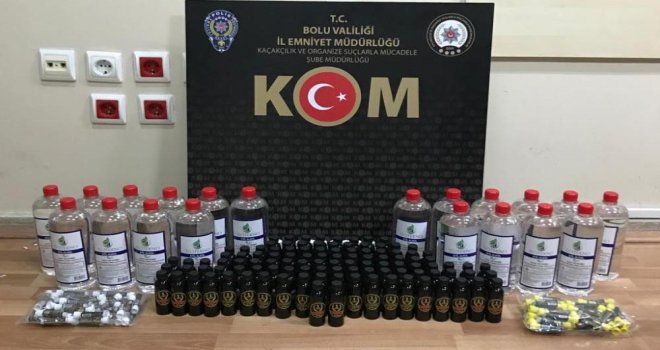 Aracında sahte içki yapımında kullanılan malzeme taşıyan şüpheliye yılbaşı sürprizi