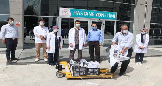 Ürettiği 200 alabalığı sağlık çalışanlarına hediye etti